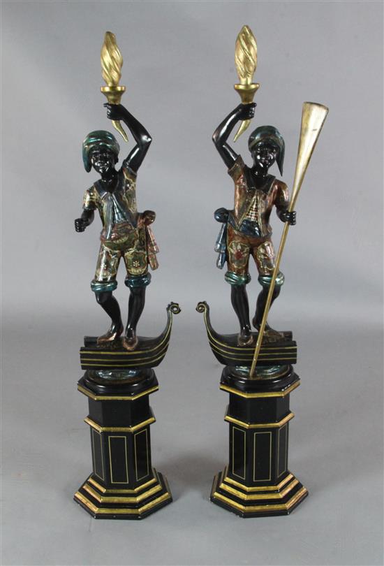 A pair of Venetian carved and painted wood blackamoors, H.3ft 11in.